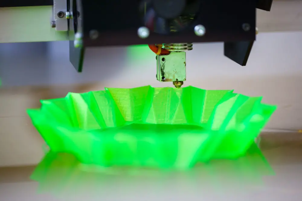 3D printer extruding filament